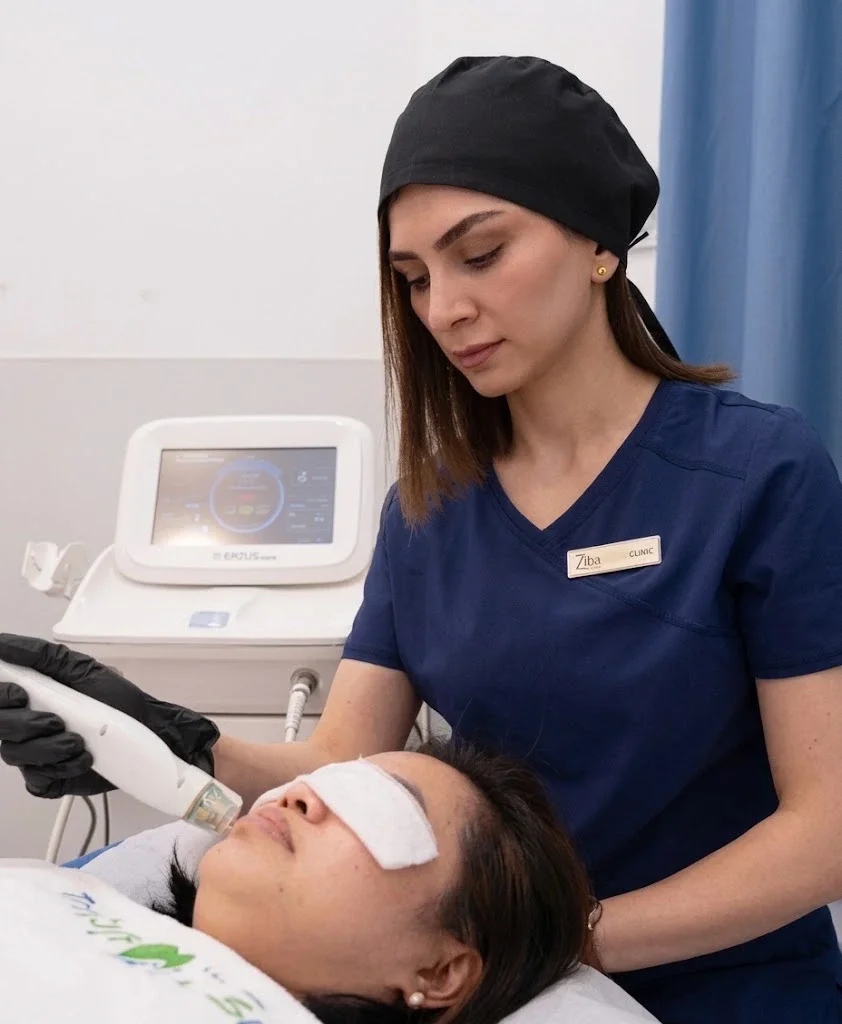 Dr. Elham Keikha performing an aesthetic treatment
