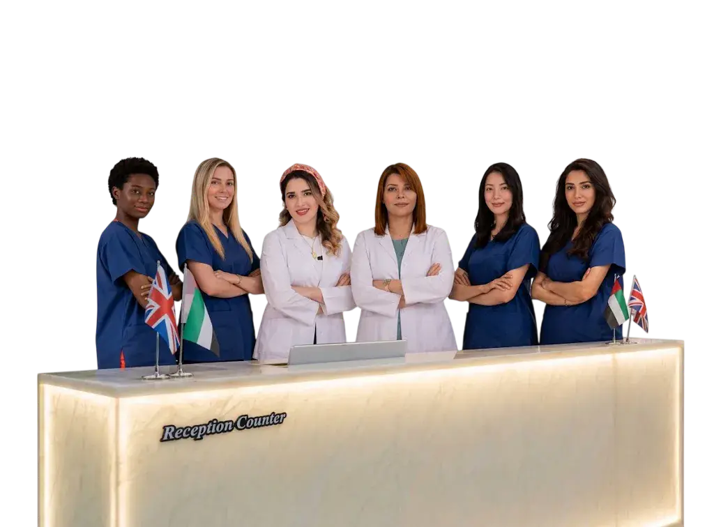 Professional medical team at Dr. Elham's clinic standing behind the reception desk with UAE and UK flags