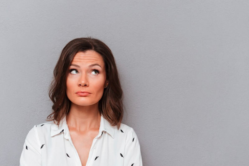 Woman with natural fine lines and wrinkles on her face